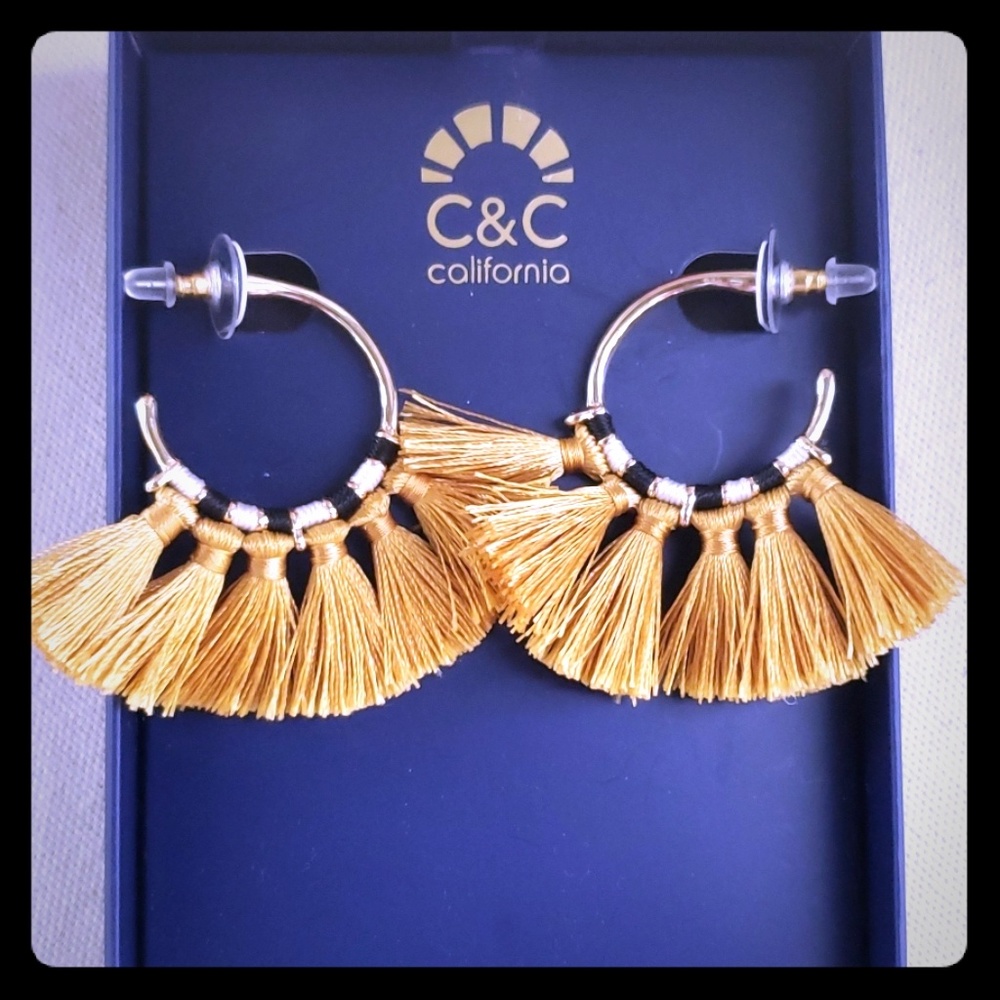 Black gold and white earrings